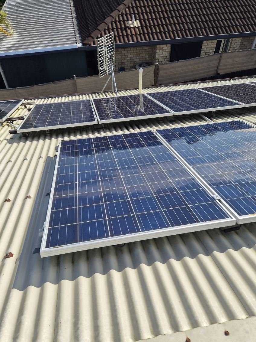 Clean rooftop solar panels free from dust and grime after cleaning