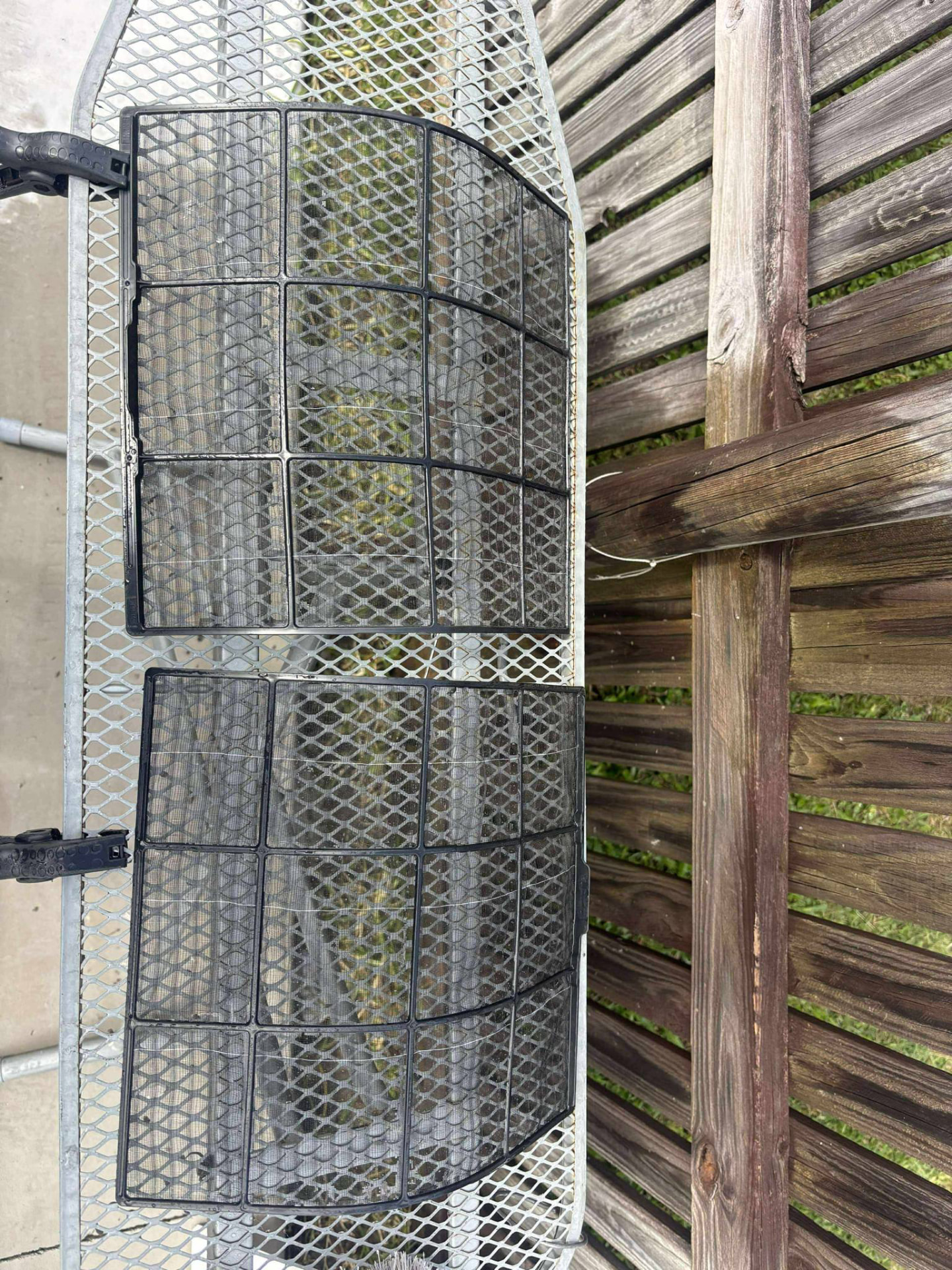 The same air conditioner filters clean and clear after washing